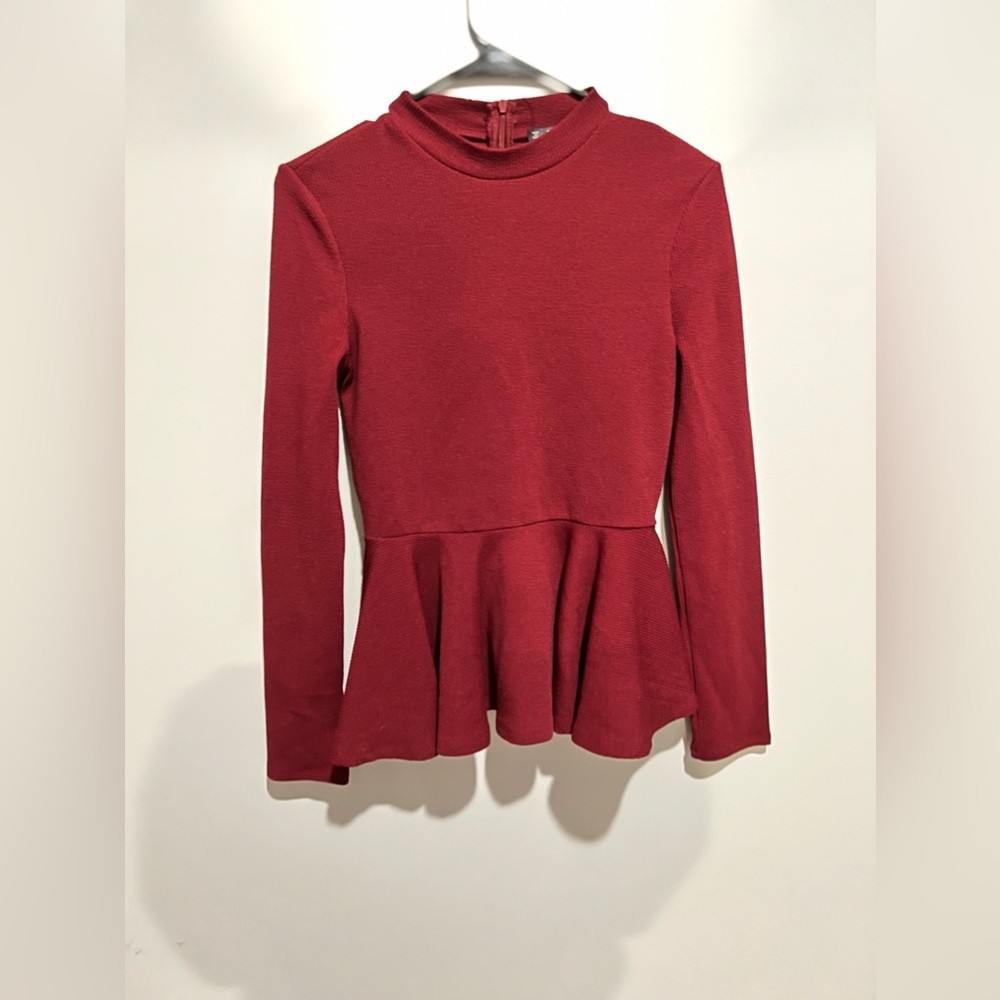Red turtle neck blouse with flair